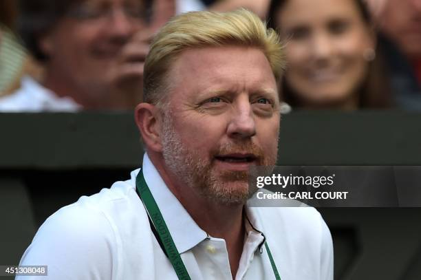 Boris Becker, former German tennis player and coach to Serbia's Novak Djokovic, watches the men's singles third round match between Djokovic and...