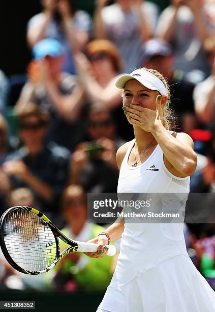 Caroline Wozniacki of Denmark celebrates after winning her Ladies' Singles third round match against Ana Konjuh of Croatia on day five of the...