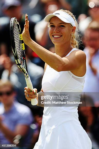 Caroline Wozniacki of Denmark celebrates after winning her Ladies' Singles third round match against Ana Konjuh of Croatia on day five of the...