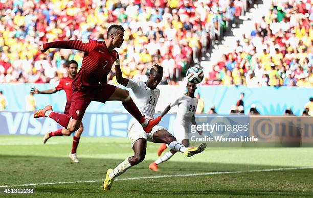 Cristiano Ronaldo of Portugal strikes unsuccessfully at goal during the 2014 FIFA World Cup Brazil Group G match between Portugal v Ghana at Estadio...