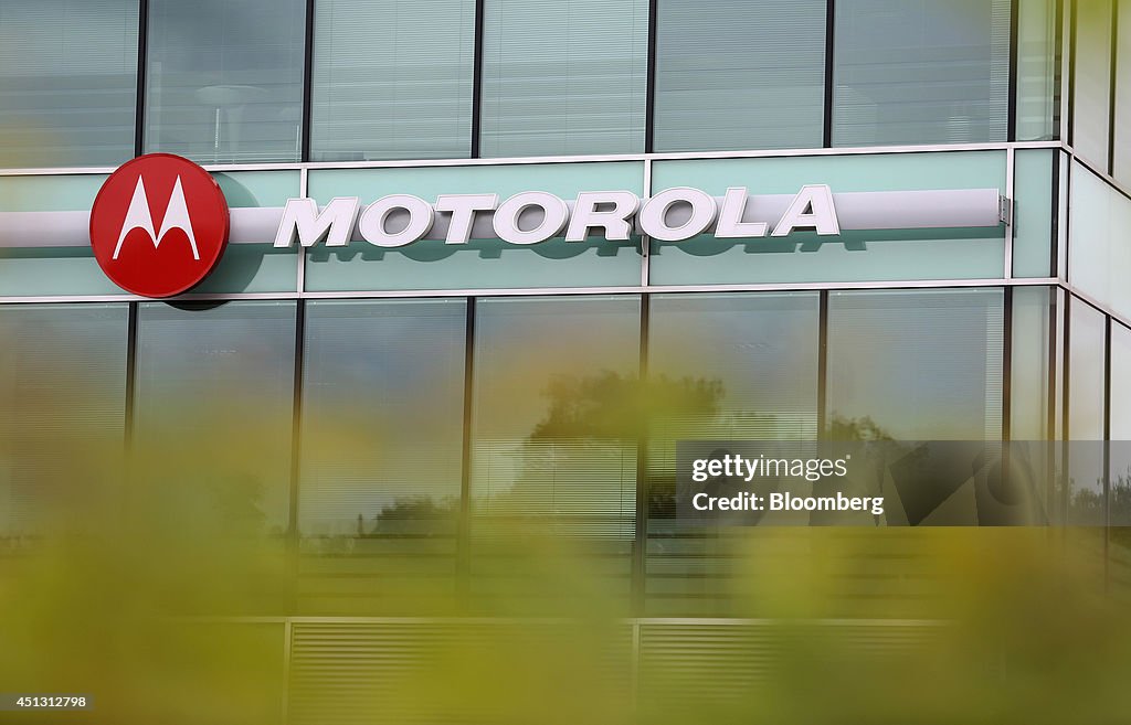 A Motorola logo sits outside the glass windows of Motorola 