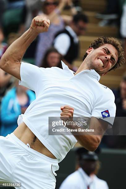 Jerzy Janowicz of Poland celebrates defeating Lleyton Hewitt of Australia in their Gentlemen's Singles second round match on day five of the...