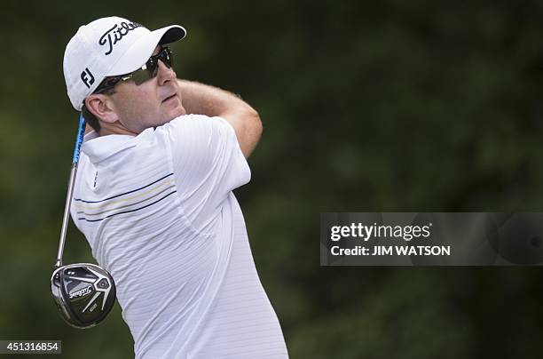 Golfer Ben Curtis tees off during the second round of the Quicken Loans National at Congressional Country Club in Bethesda, Maryland, June 27, 2014....