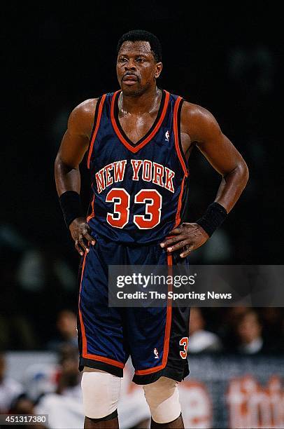 Patrick Ewing of the New York Knicks stands on the court during the game against the Houston Rockets on November 18, 1997 at the Compaq Center in...