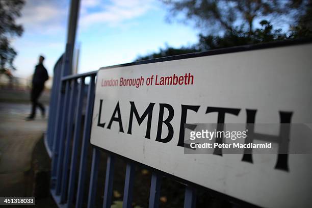 Man walks near a road sign in Lambeth on November 22, 2013 in London, England. British police have reported that three women who have allegedly been...