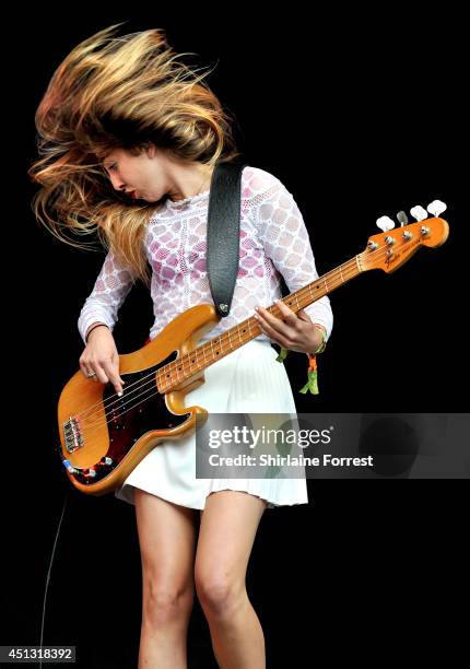 Este Haim of Haim performs on The Other Stage on Day 1 of the Glastonbury Festival at Worthy Farm on June 27, 2014 in Glastonbury, England.