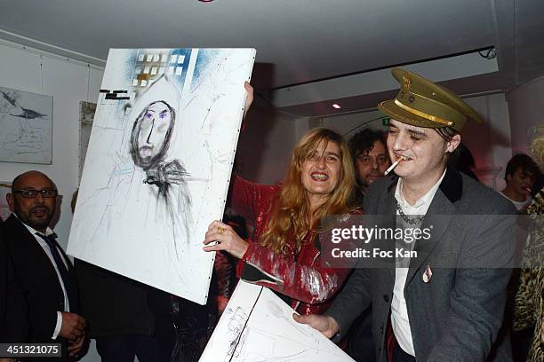 Geraldine Beigbeder and Pete Doherty attend the 'Flags From The Old Regime' : Pete Doherty and Alize Meurisse Paintings Exhibition Preview At Espace...