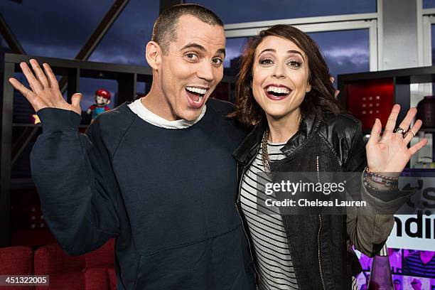 Tv personalities Steve-O and Shira Lazar visit 'What's Trending' on November 21, 2013 in Hollywood, California.