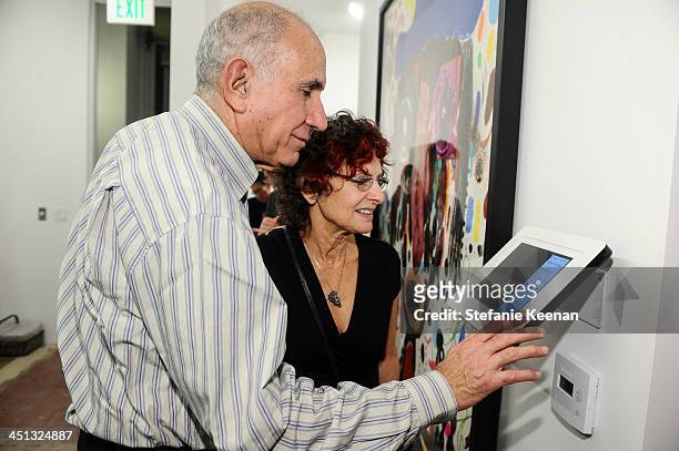Michael Hort and Susan Hort attend The Rema Hort Mann Foundation LA Artist Initiative Benefit Auction on November 21, 2013 in Los Angeles, California.