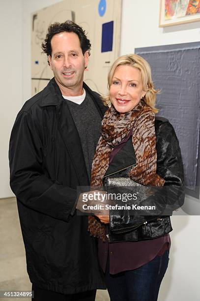 Michael Eisenberg and Laurie Eisenberg attend The Rema Hort Mann Foundation LA Artist Initiative Benefit Auction on November 21, 2013 in Los Angeles,...