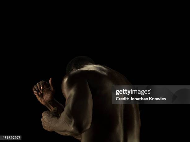 rare view of athletic male - black male bodybuilders foto e immagini stock