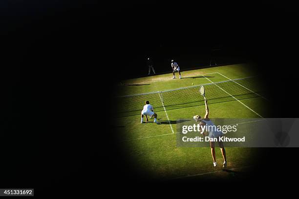 Naomi Broady of Great Britain serves during her Mixed Doubles first round match with Neal Skupski against Robert Farah of Colombia and Darija Jurak...