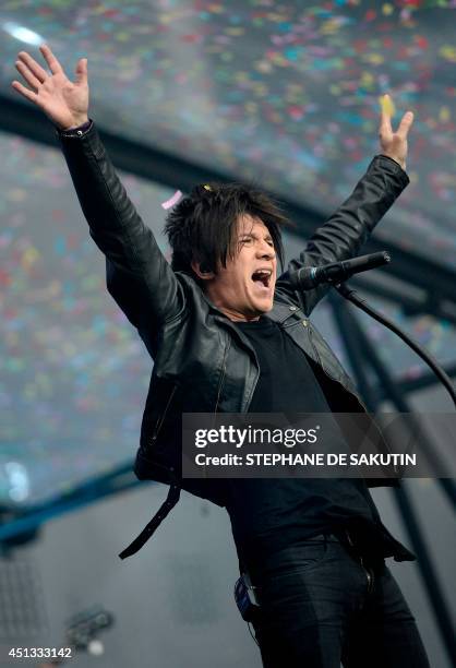 French singer Nicolas Sirkis from Indochine band performs on June 27, 2014 at the Stade de France, in Saint-Denis, north of Paris. AFP PHOTO /...