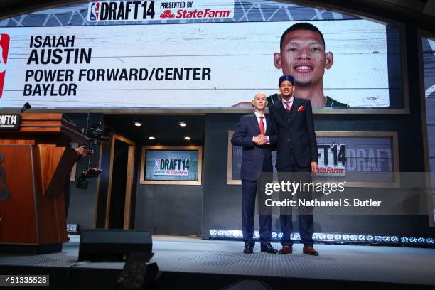 Isaiah Austin shakes hands with NBA Commissioner Adam Silver after being selected number overall by the during the 2014 NBA Draft on June 26, 2014 at...