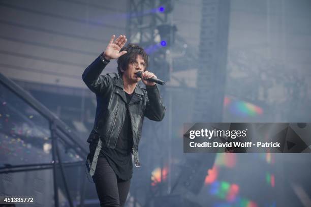 Nicola Sirkis from Indochine performs at Stade de France on June 27, 2014 in Paris, France.