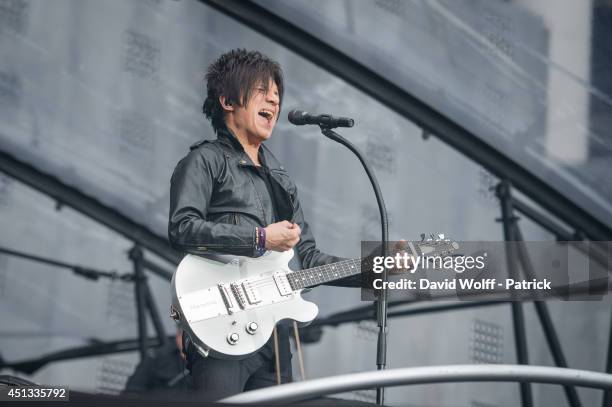 Nicola Sirkis from Indochine performs at Stade de France on June 27, 2014 in Paris, France.