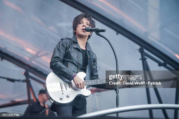 Nicola Sirkis from Indochine performs at Stade de France on June 27, 2014 in Paris, France.