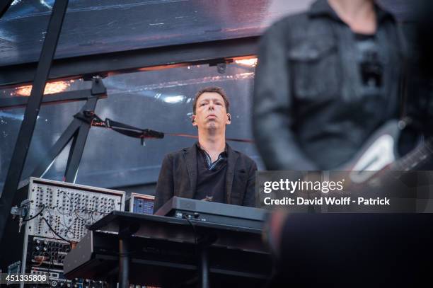 Matu from Indochine performs at Stade de France on June 27, 2014 in Paris, France.