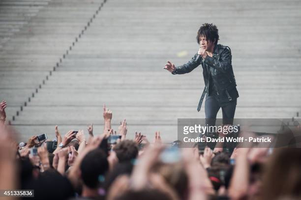 Nicola Sirkis from Indochine performs at Stade de France on June 27, 2014 in Paris, France.