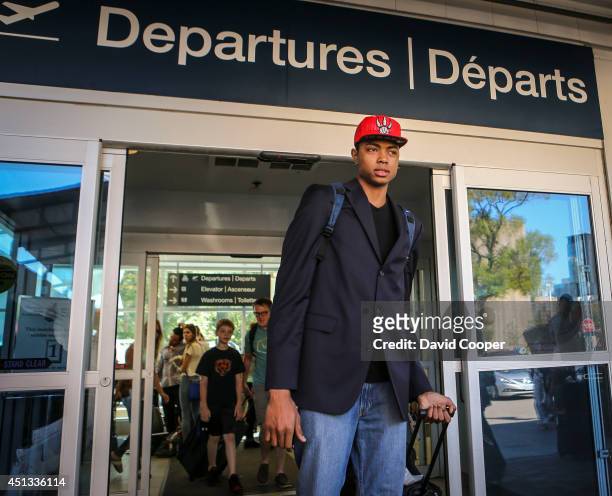 Brazilian Basketball player Bruno Caboclo drafted 20th over all by the Raptors arrives on Porter Airlines from Newark NJ at Billy Bishop Airport in...