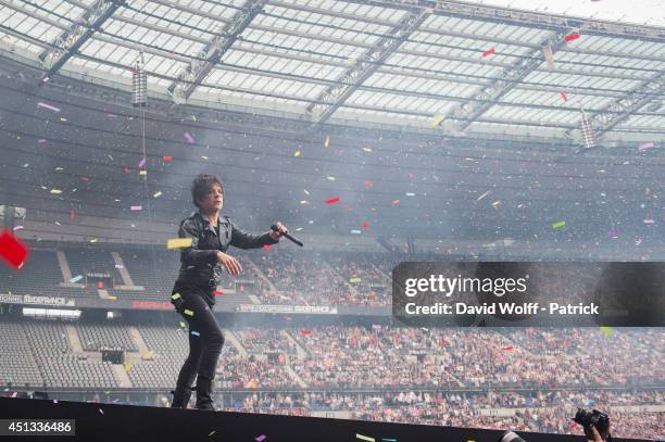 Nicola Sirkis from Indochine performs at Stade de France on June 27, 2014 in Paris, France.