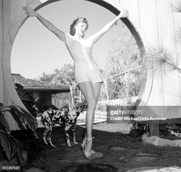 Actress Rhonda Fleming pose at home in Los Angeles, California.