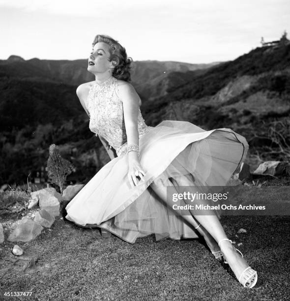 Actress Rhonda Fleming pose at home in Los Angeles, California.