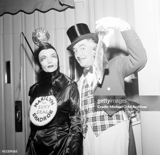 Actor Reginald Gardiner with his wife Nadia Petrova attends Sonja Henie Circus Party in Los Angeles, California.