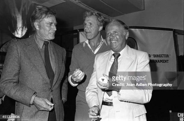 Actors Charlton Heston, Wayne Rogers and Dick Van Patten at a party honoring Heston as the host of a tennis tournament benefiting the American Film...