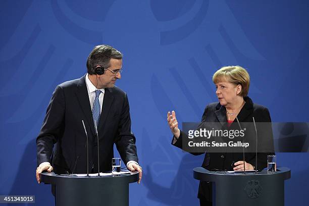 German Chanellor Angela Merkel and Greek Prime Minister Antonis Samaras speak to the media following talks at Chancellery on November 22, 2013 in...