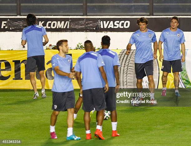 Diego Lugano of Uruguay drives the ball during a training session as part of the 2014 FIFA World Cup on June 27, 2014 in Rio de Janeiro, Brazil....