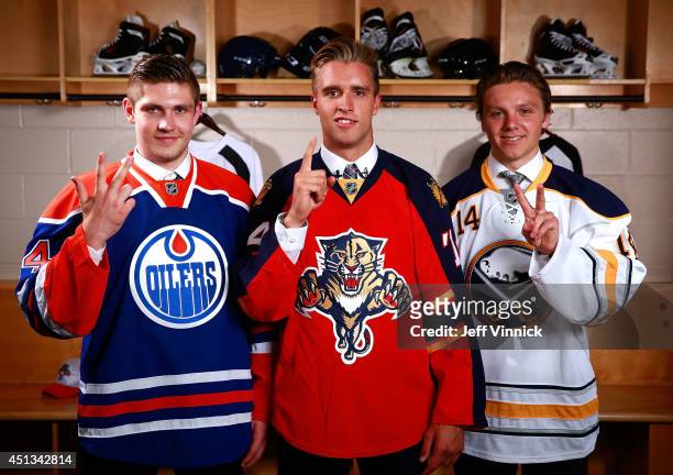 Third overall pick Leon Draisaitl of the Edmonton Oilers, first overall pick Aaron Ekblad of the Florida Panthers and second overall pick Sam...