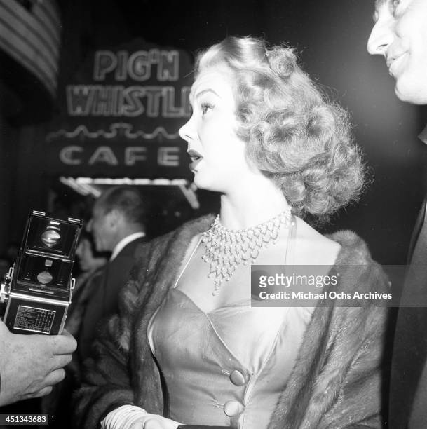 Actress Mitzi Gaynor attends a party at the Pig'n Whistle in Los Angeles, California.