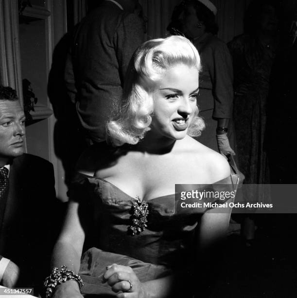 Actress Diana Dors attends her cocktail party in Los Angeles, California.