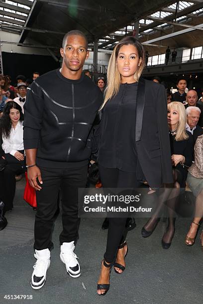 Victor Cruz and Elaina Watley attend the Givenchy show as part of the Paris Fashion Week Menswear Spring/Summer 2015 on June 27, 2014 in Paris,...