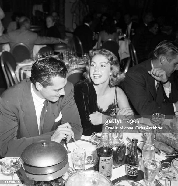 Conrad Hilton, Jr with Betsy von Furstenberg at dinner at the Cocoanut Grove in Los Angeles, California.