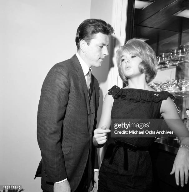Actress Joey Heatherton with John Ashley at a party in Los Angeles, California.