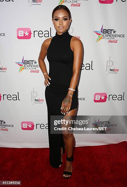 Model Karrueche Tran attends the fashion show presented by Pantene and Poetic Justice Jeans during the 2014 BET Experience At L.A. LIVE on June 27,...