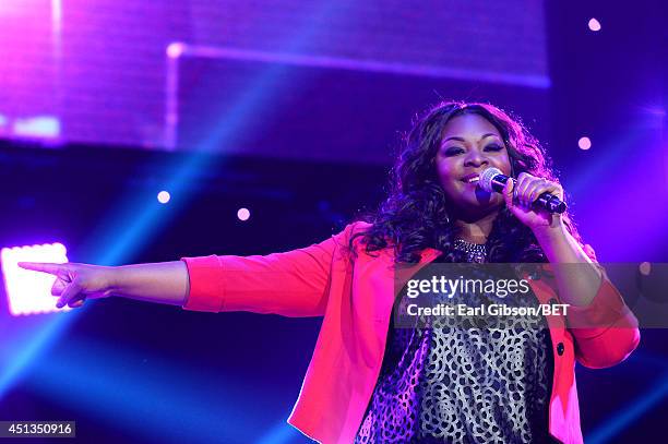 Singer Candice Glover performs onstage at the Maxwell, Jill Scott, Marsha Ambrosius and Candice Glover concert during the 2014 BET Experience At L.A....