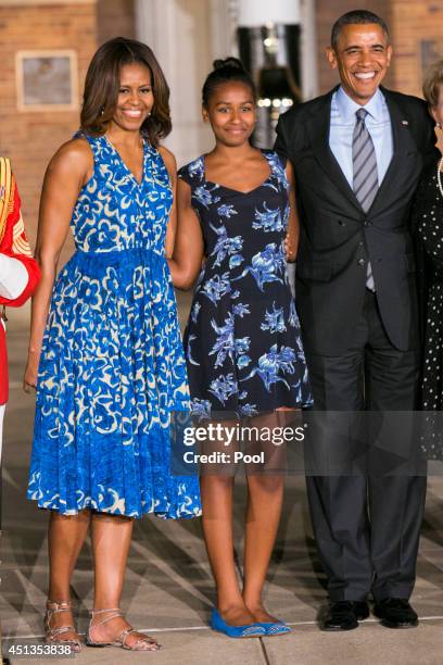 First lady Michelle Obama, daughter Sasha Obama and U.S. President Barack Obama attend the Marine Barracks Evening Parade on June 27, 2014 in...