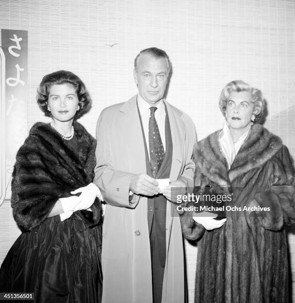 Actor Gary Cooper poses with wife Veronica Balfe and their daughter Maria Cooper as they attend a WAIF ball in Los Angeles,California.