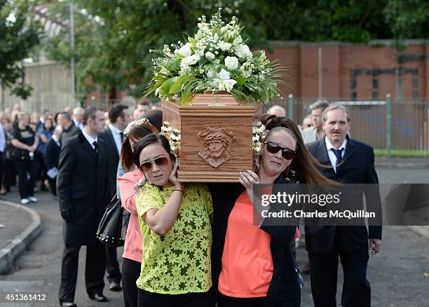 The coffin of Gerry Conlon is carried from his home in Blackwater Way by distraught family members to St. Peter's Cathedral for a requiem mass on...