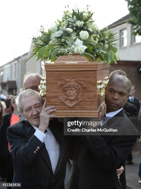 The coffin of Gerry Conlon is carried by an emotional Paddy Hill a member of the so-called Birmingham Six into St. Peter's Cathedral for a requiem...