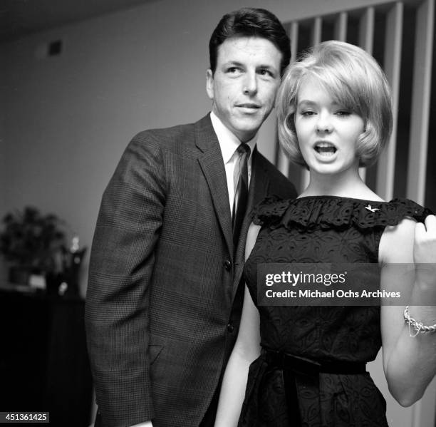 Actress Joey Heatherton with John Ashley at a party in Los Angeles, California.