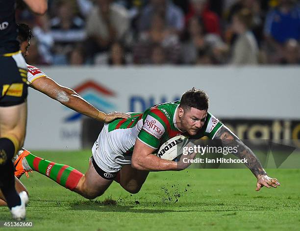 Chris McQueen of the Rabbitohs scores a try during the round 16 NRL match between the North Queensland Cowboys and the South Sydney Rabbitohs at...