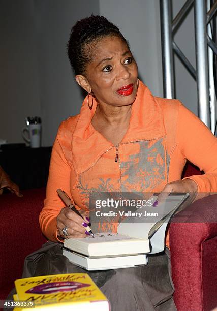 Author Terry McMillan attends Miami Book Fair International 2013 - An Evening With Terry McMillan signing copies of her book "Who Asked You?" at...