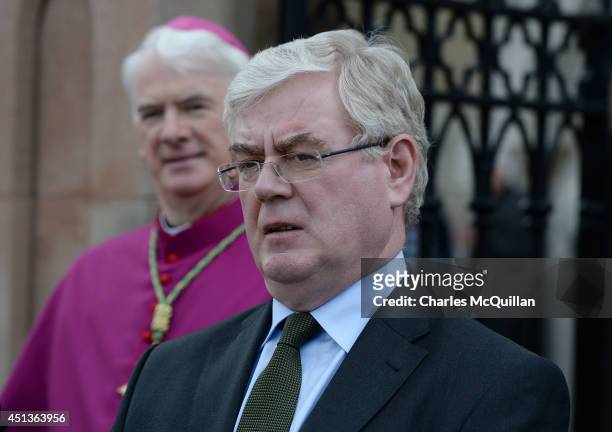Irish Tanaiste Eamon Gilmore attends the funeral of Gerry Conlon at St. Peter's Cathedral for requiem mass on June 28, 2014 in Belfast, Northern...