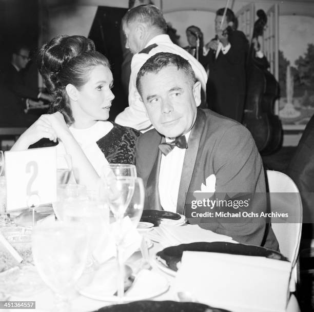 Actor Glenn Ford and wife actress Kathryn Hays attend the premier party for "The Bible" in Los Angeles, California.