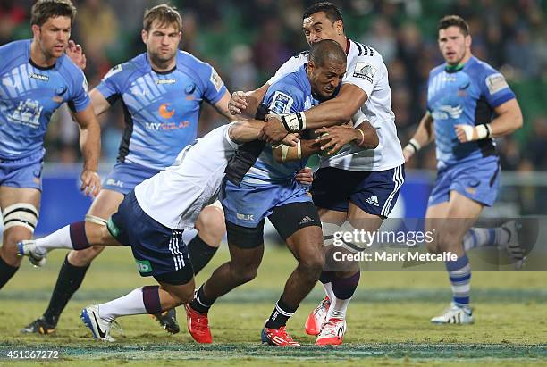 Marcel Brache of the Force is tackled during the round 17 Super Rugby match between the Force and the Blues at nib Stadium on June 28, 2014 in Perth,...