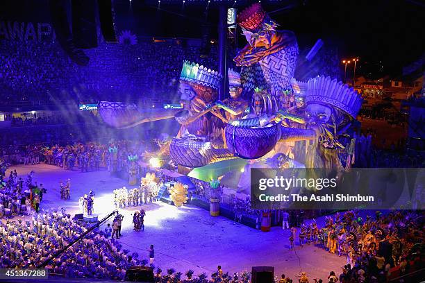 Participants perform during the Boi Bumba festival on June 27, 2014 in Parintins, Brazil. The festival is thought to be the beiggest outdoor opera in...